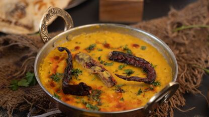 Indiase curry met kip, kokos en linzen